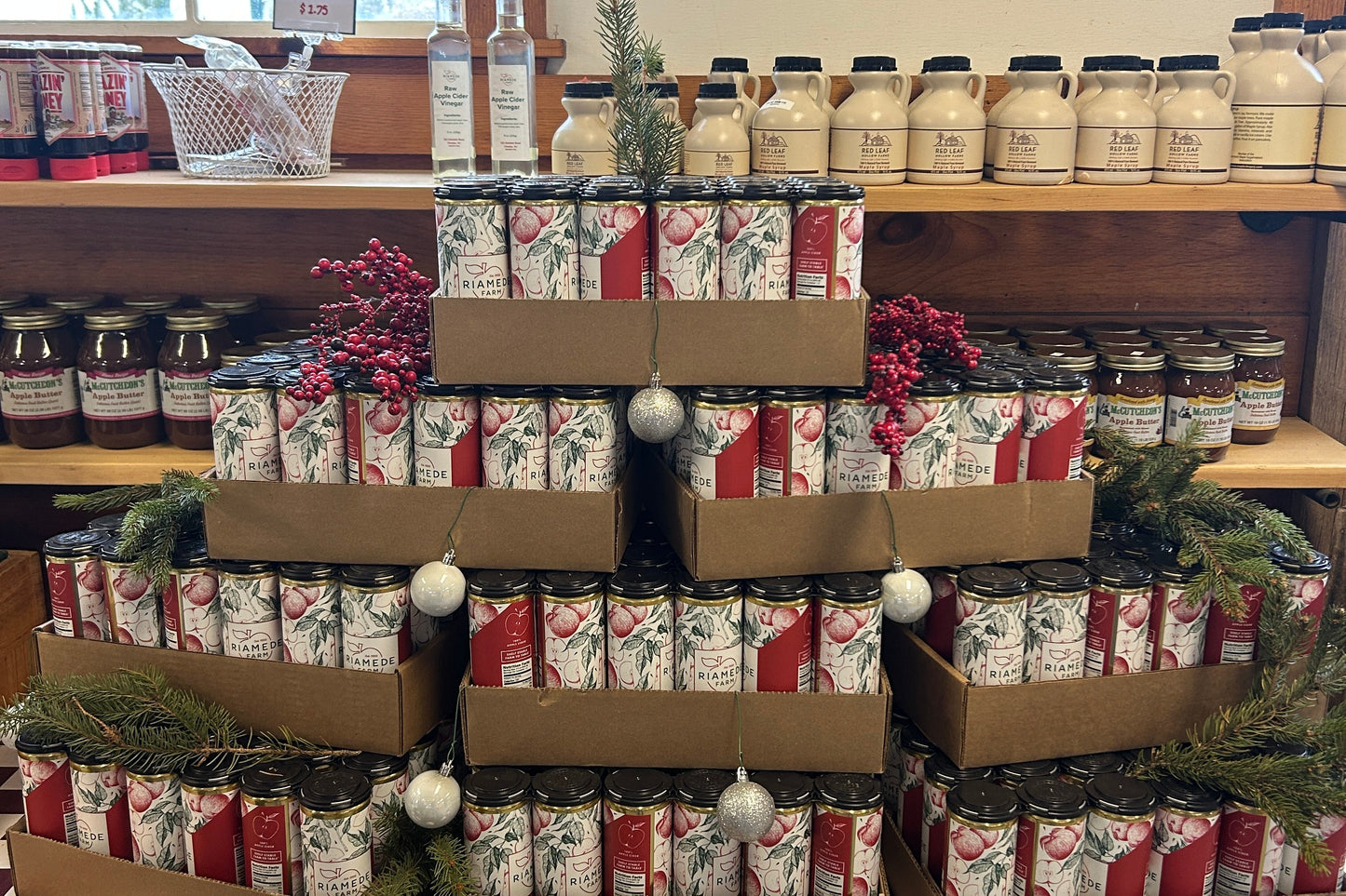 stack of cider boxes on a checkered shelf